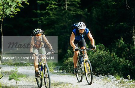 Man and woman cycling