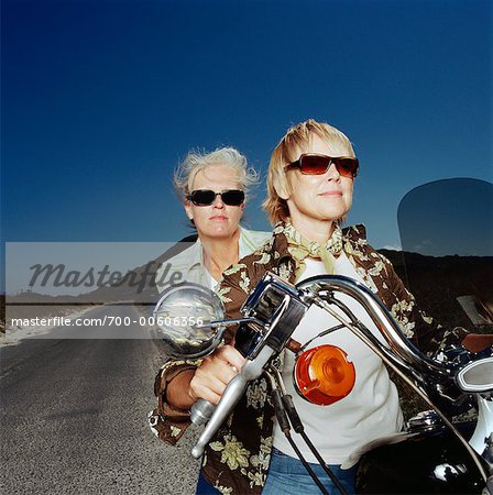 Two Women Riding Motorcycle