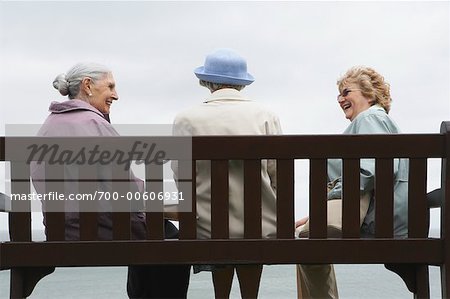 Women Chatting on Bench