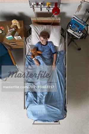 Boy in Hospital Bed