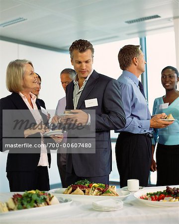 Business People Eating at Office