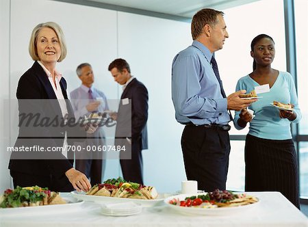 Business People Eating at Office