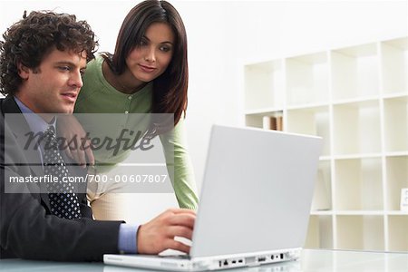 Business People Using Laptop