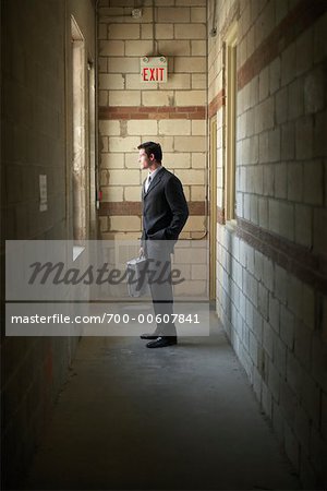 Businessman Looking Out Window