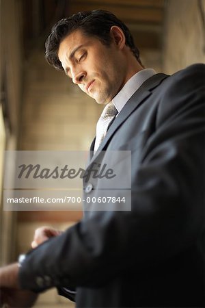 Businessman Checking Time