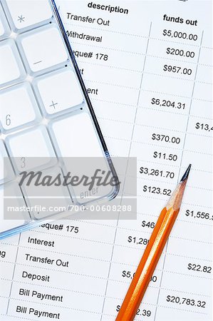 Bank Statement, Computer Keyboard and Pencil