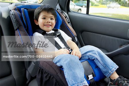 Portrait of Boy in Car Seat