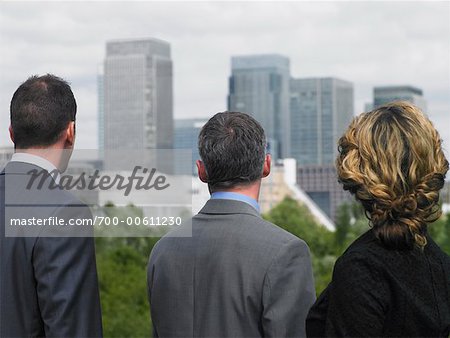 Business People Looking at Office Towers
