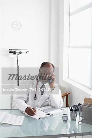 Portrait of Doctor Working at Desk