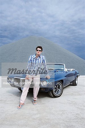 Man Leaning on Car