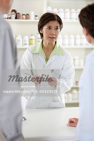 Pharmacist Helping Customers