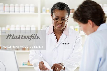 Pharmacist Talking to Patient