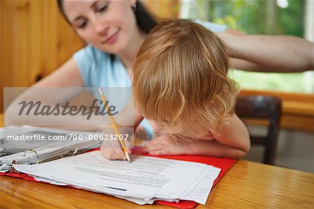 Girl Writing on Papers