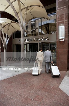 Couple Walking into Hotel