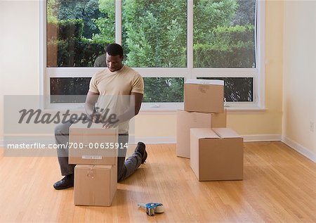 Man Packing Boxes