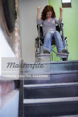Girl in Wheelchair at Top of Stairs