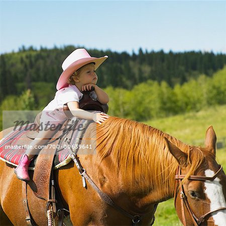 Kind auf dem Pferd