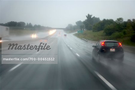 Cars on Highway During Rain Storm