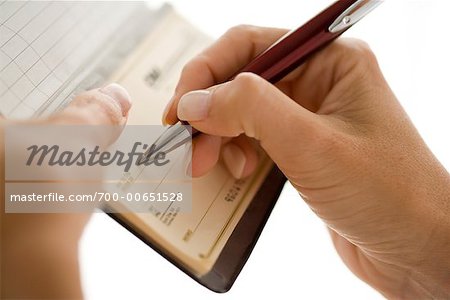 Woman Writing Cheque