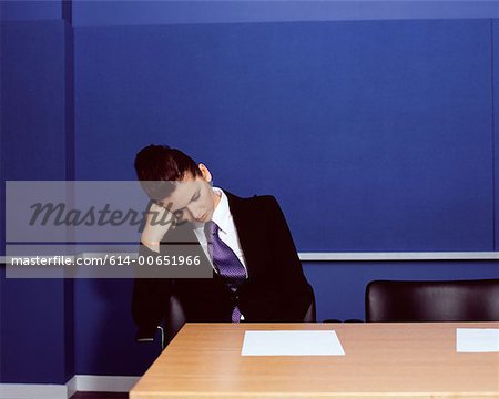 Businesswoman sleeping in office