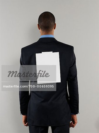 Businessman with Blank Paper on His Back