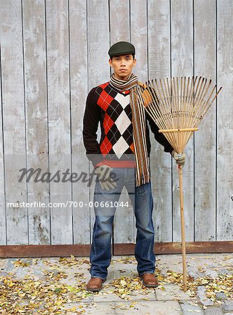 Man Holding Rake