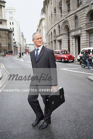 Businessman Crossing Street