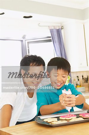 Man and Boy Making Cookies
