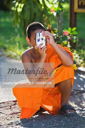 Moine bouddhiste, prendre des photos, Luang Prabang, Laos