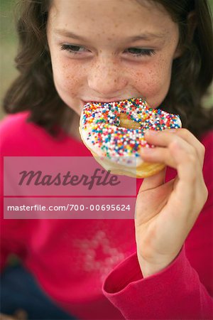 Girl Eating Doughnut