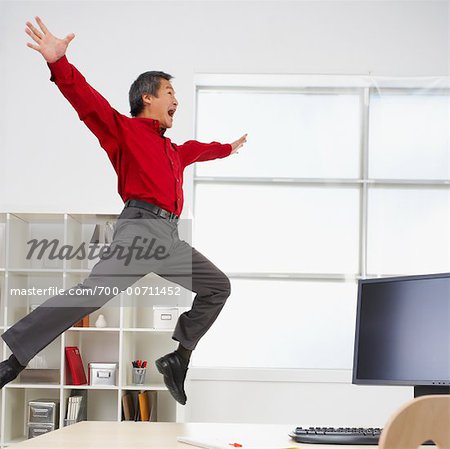 Businessman Jumping in the Air