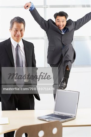 Businessman About to Attack Another Businessman