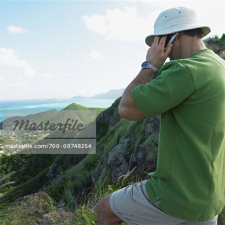 Man Talking on Cellular Phone, Oahu, Hawaii