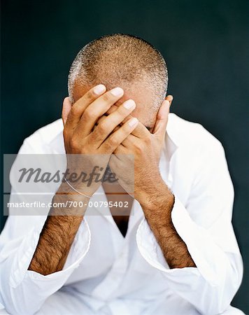 Portrait of Man with Head in Hands