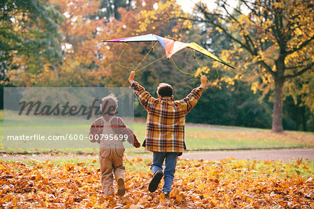 Boys Running with Kite