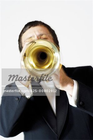 Close-up of a musician playing the trumpet