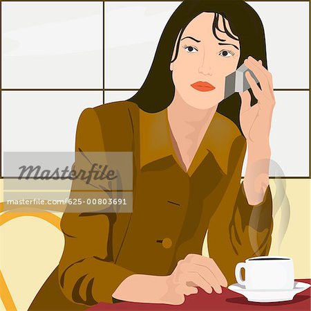 Femme parlant sur un téléphone mobile dans un restaurant