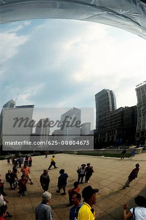 Low angle view of a skyscrapers in a city, Cloud Gate sculpture, Chicago, Illinois, USA
