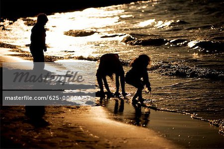 High angle view of children playing on the beach, San Diego, California, USA