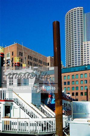 Boat in front of skyscrapers, Boston, Massachusetts, USA