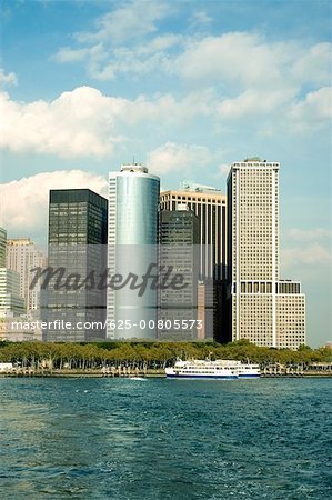 Boat in front of skyscrapers, New York City, New York State, USA