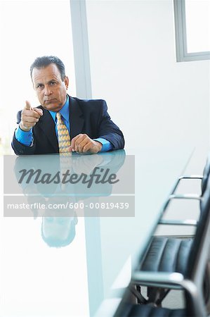 Businessman in Boardroom