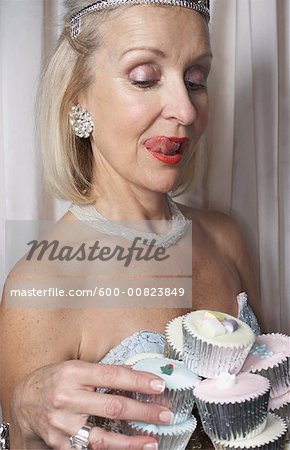 Woman Holding Cupcakes