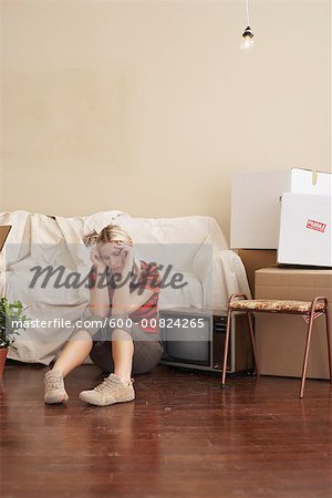 Woman Sitting in New Home