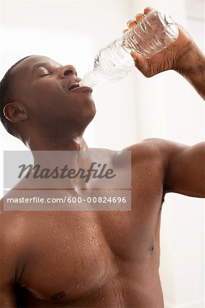 Portrait of Man Drinking Water