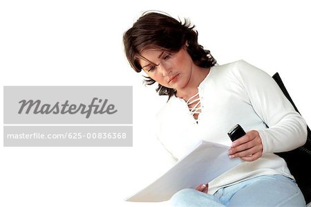 Close-up of a businesswoman reading documents