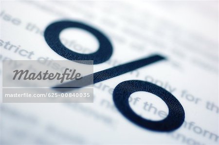Close-up of a percentage sign on a document