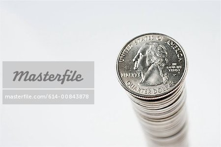Stack of quarter dollar coins Stack of quarter dollar coins