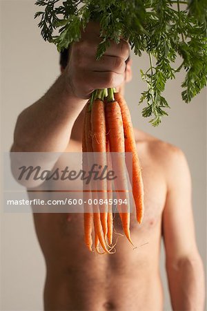 Man Holding Carrots