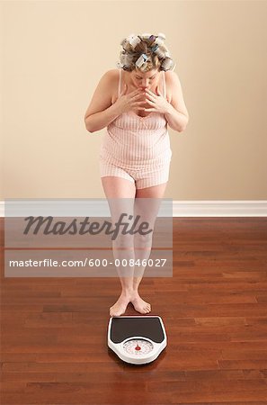 Woman Stepping onto Scale